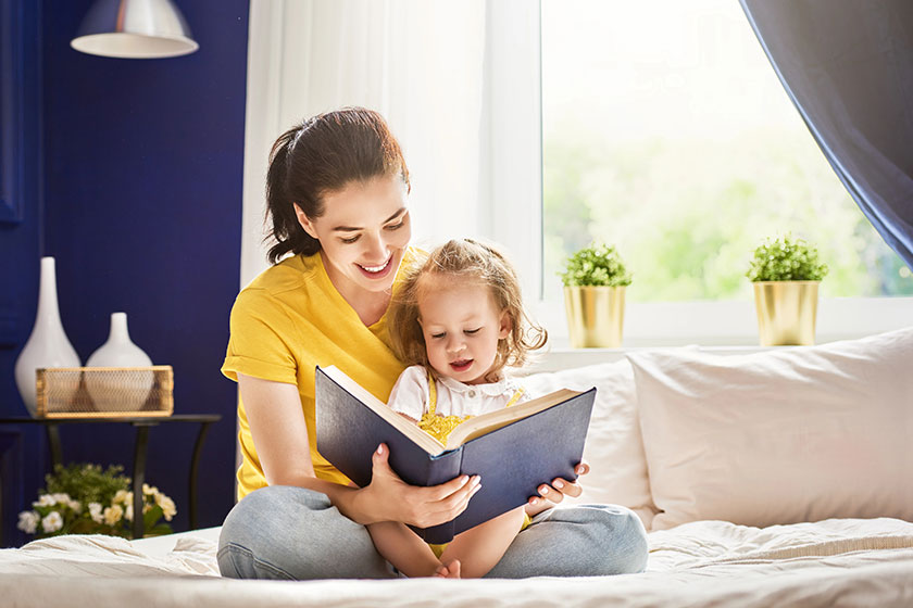 Mother reading a book